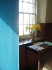 day lilies in church door